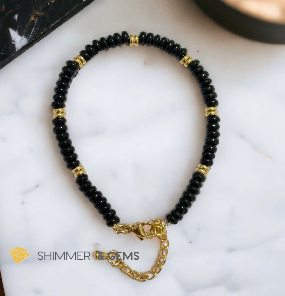 Black Onyx 4mm Rondelle Bracelet with stainless steel chain