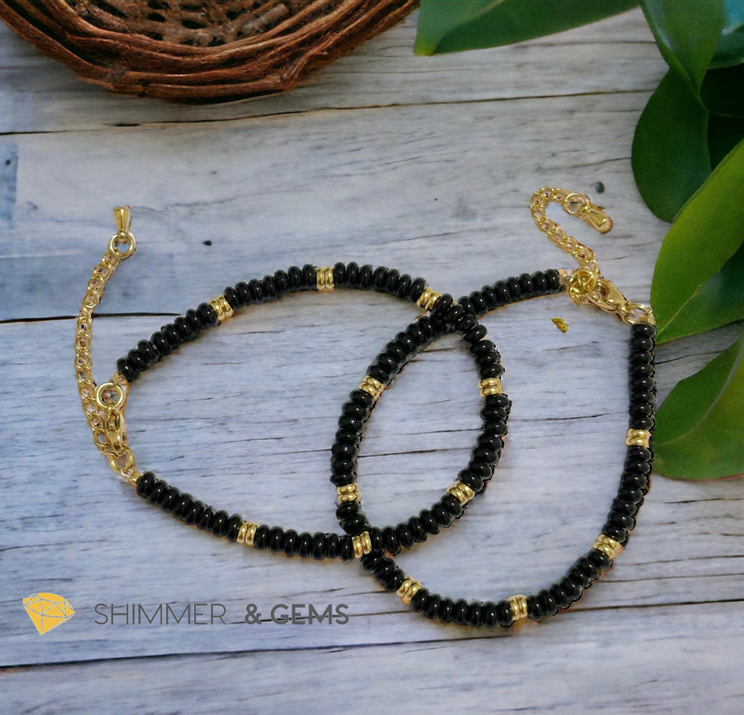 Black Onyx 4mm Rondelle Bracelet with stainless steel chain