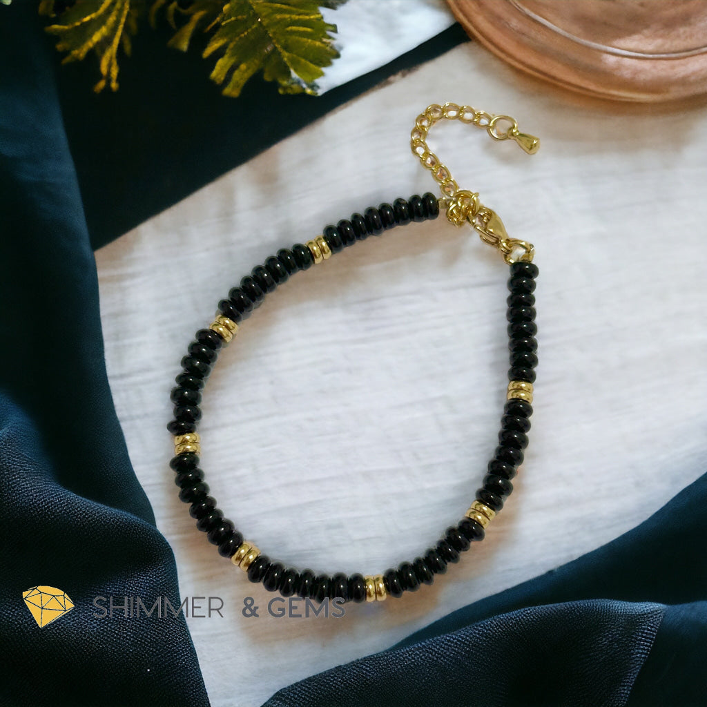 Black Onyx 4mm Rondelle Bracelet with stainless steel chain