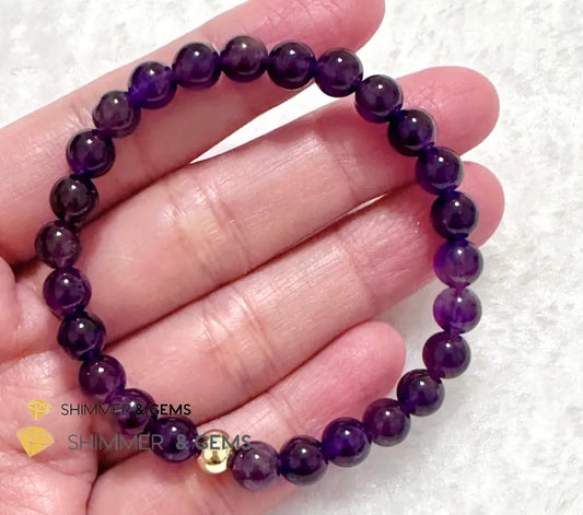 Amethyst 6mm Bracelet with 14k gold filled bead 5.5” Bracelets