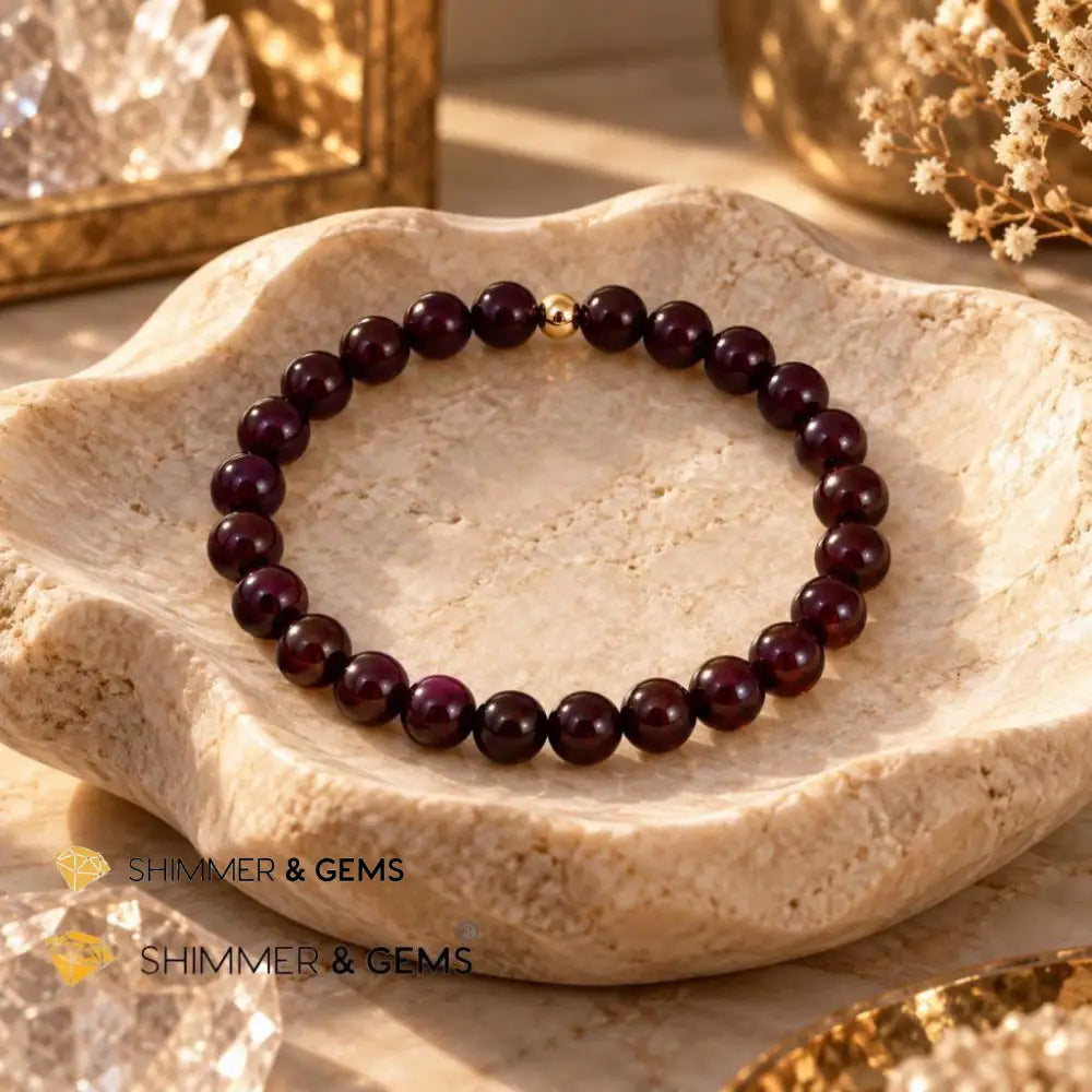 Garnet 6mm Bracelet with 14k gold filled bead - 5.5”