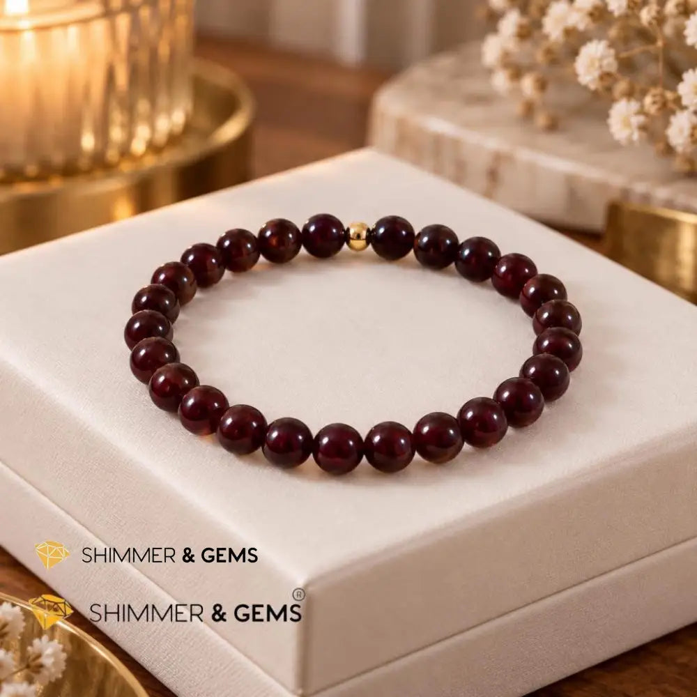 Garnet 6mm Bracelet with 14k gold filled bead - 6.5”