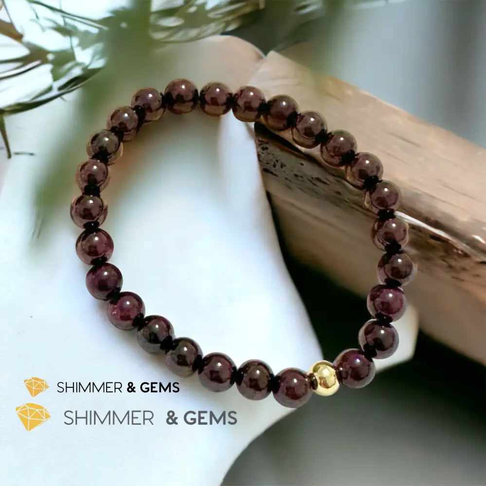 Garnet 6mm Bracelet with 14k gold filled bead 6” Bracelets