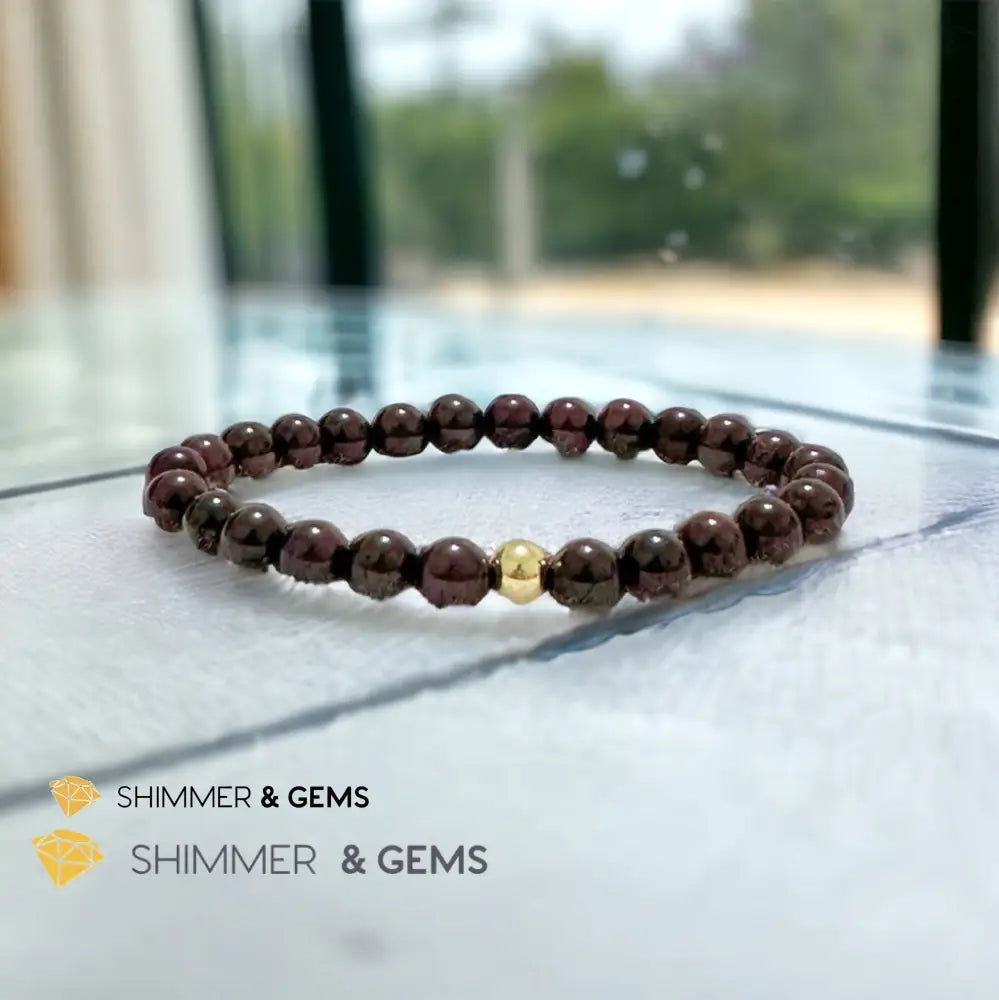 Garnet 6mm Bracelet with 14k gold filled bead Bracelets