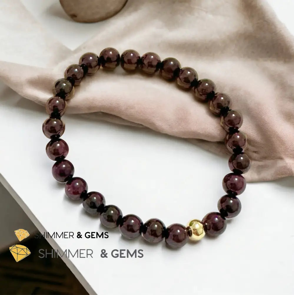 Garnet 6mm Bracelet with 14k gold filled bead Bracelets