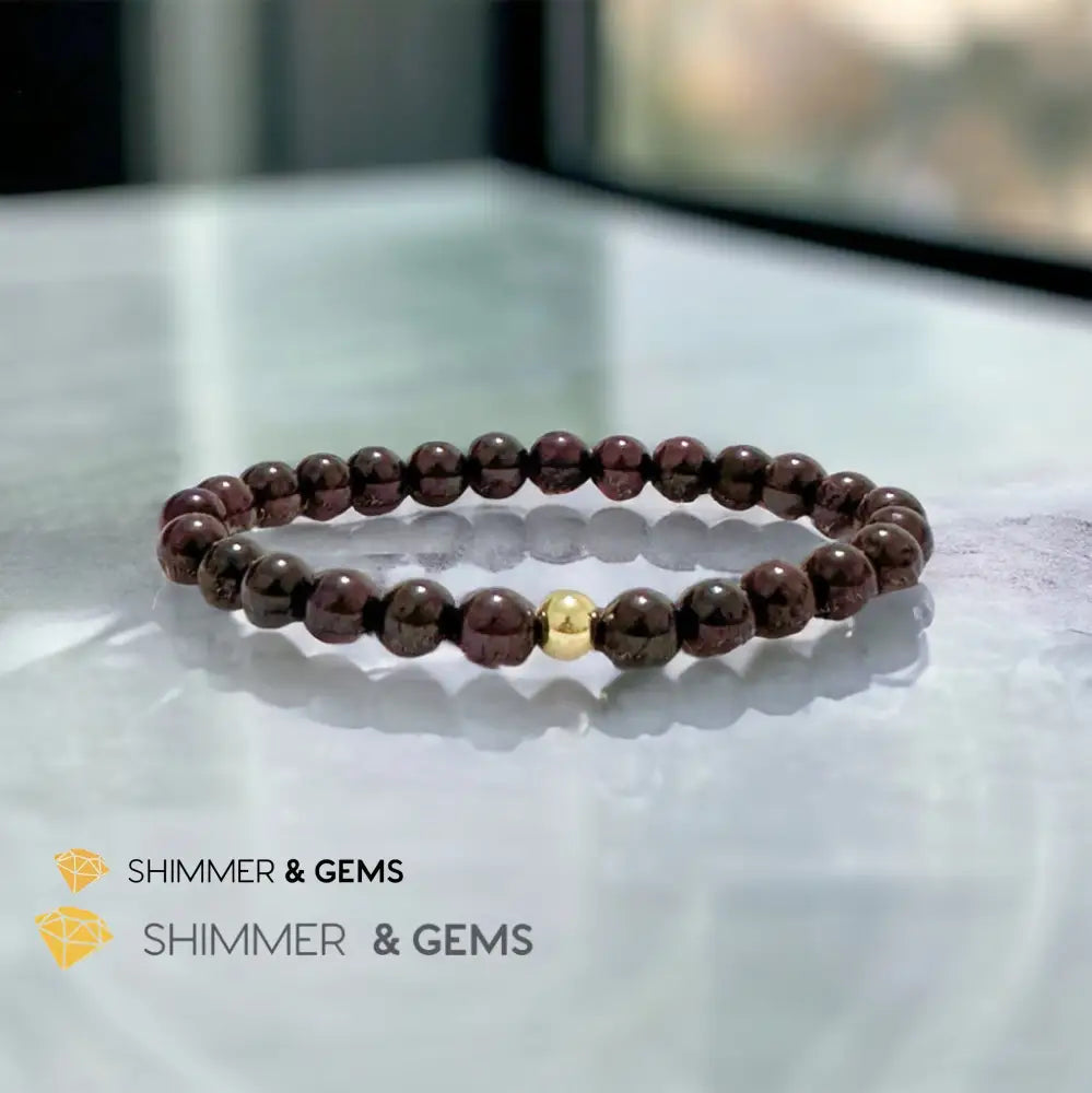 Garnet 6mm Bracelet with 14k gold filled bead Bracelets