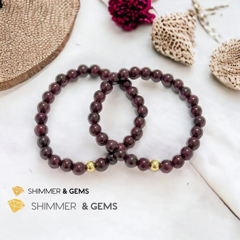 Garnet 6mm Bracelet with 14k gold filled bead Bracelets