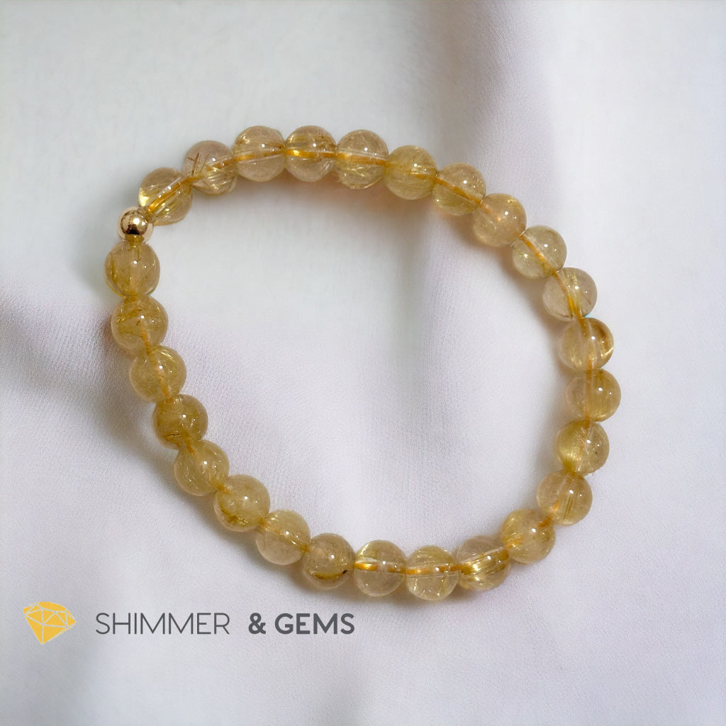 Golden Rutilated 7mm AAAA Grade Bracelet with 14k gold filled Bead