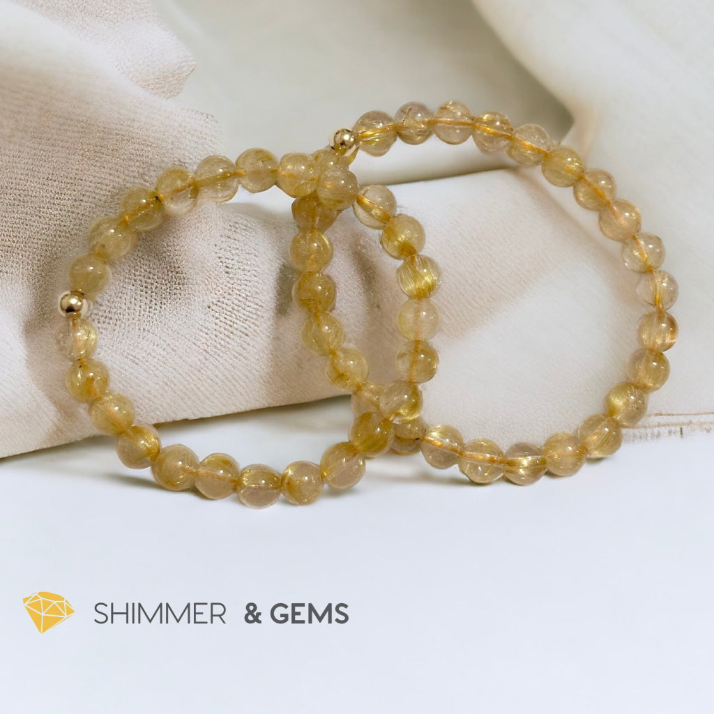 Golden Rutilated 7mm AAAA Grade Bracelet with 14k gold filled Bead