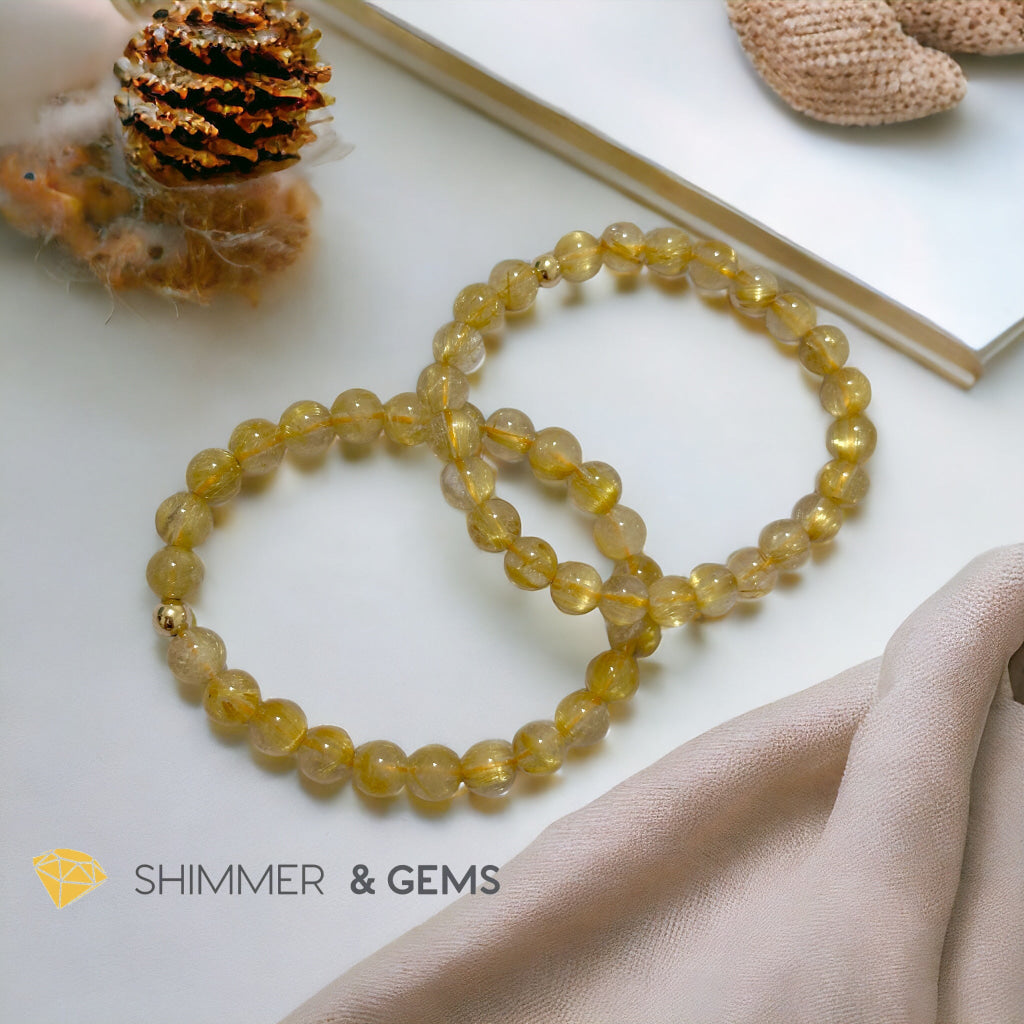 Golden Rutilated 7mm AAAA Grade Bracelet with 14k gold filled Bead