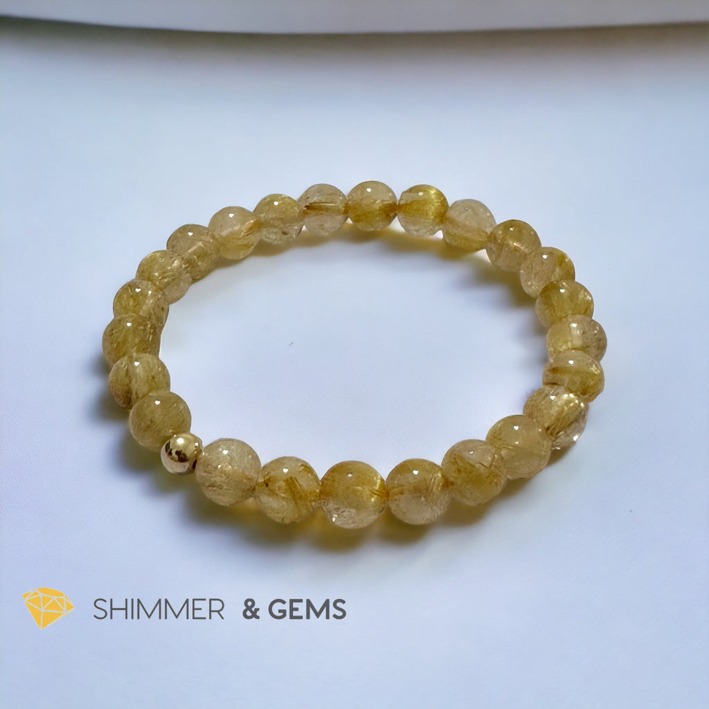 Golden Rutilated 7mm AAAA Grade Bracelet with 14k gold filled Bead